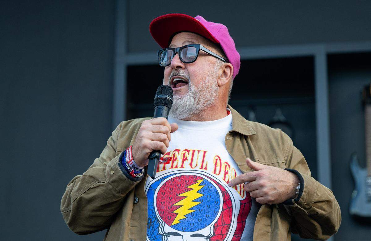 Celebrity chef Andrew Zimmern shows of his Grateful Dead T-shirt before a cooking demonstration at the BottleRock music festival in Napa on Friday, May 23, 2025. 