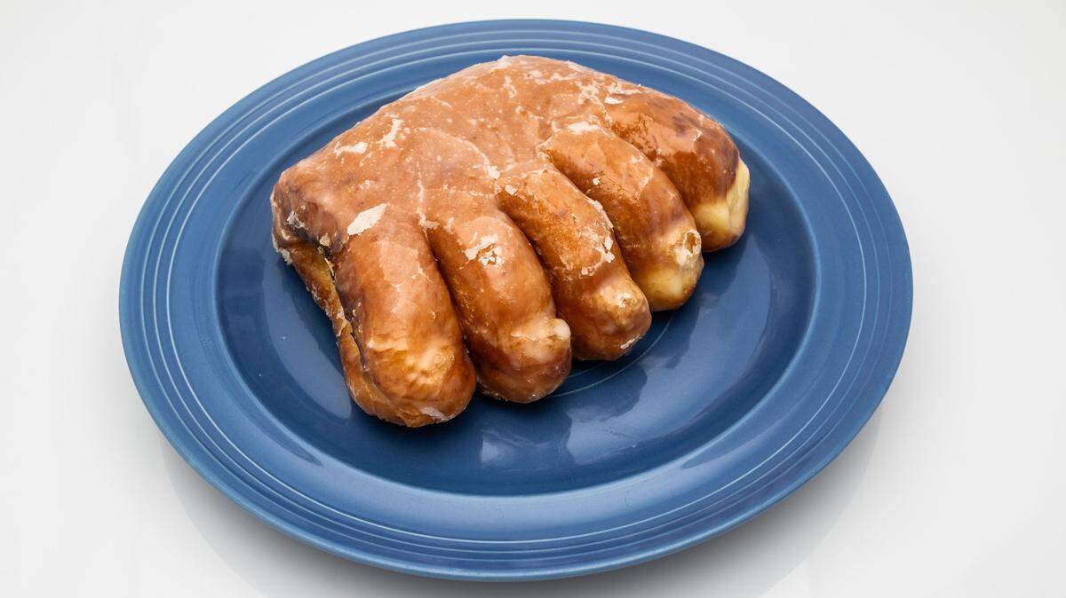 A bear claw from Broadway Doughnuts is ready to eat on Tuesday. According to Wikipedia, “The name bear claw as used for a pastry is first attested in March 1914 by the Geibel German Bakery, located at 915 K Street in downtown Sacramento.”