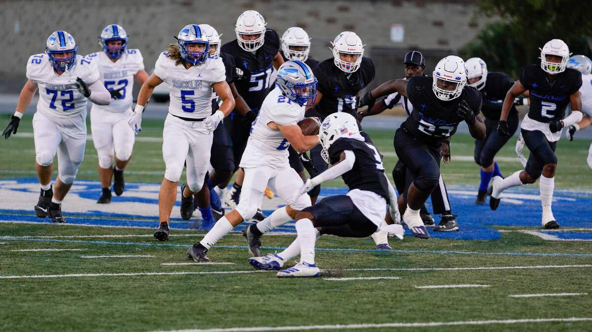 Rocklin running back Anthony Johnston (21) ran for 123 yards and a touchdown in a 43-14 win over Capital Christian.