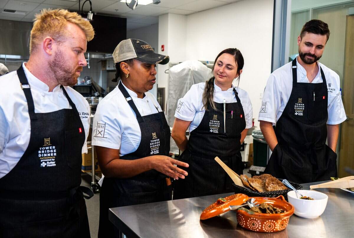 Chefs Devin Dedier, N’Gina Guyton, Jeana Marie and Bucky Bray present the third course of the Tower Bridge Dinner — braised California bison — at the Tower Bridge Dinner preview on Monday.