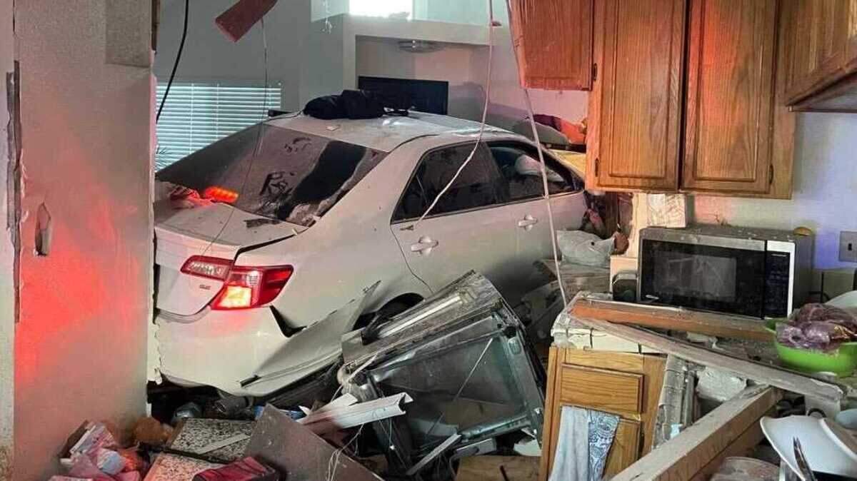 A white Toyota Camry rests after its driver crashed into a house on the 8200 block of Spengler Road in south Sacramento after a short pursuit with the Sacramento County Sheriff’s Office on Sunday, June 4, 2023. Amar Gandhi, a spokesman for the Sheriff’s Office, said the driver is expected to face charges.