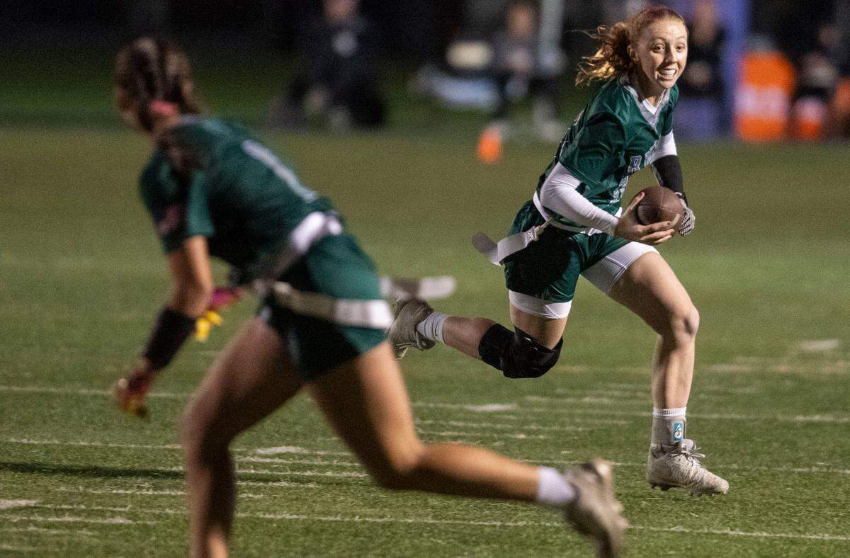 Ponderosa Bruins quarterback Brooklynn Nordquist (16) scrambles against Woodcreek during the Sac-Joaquin Section Division II championship girls flag football game on Saturday.
