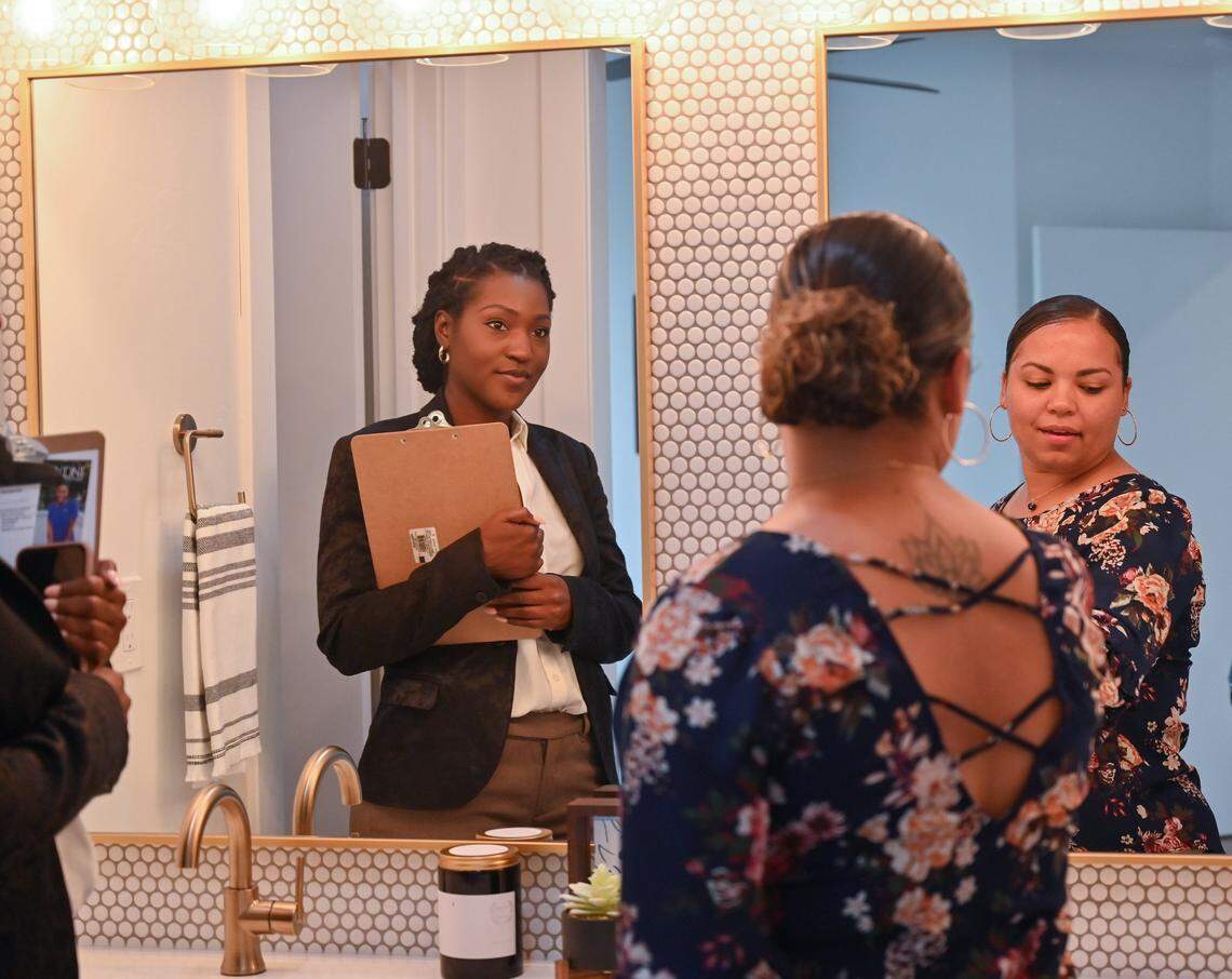 Real estate agent Syndi Chattman shows a Curtis Park property to Elizabeth Peters on Sunday, Aug. 15, 2021. Peters has purchased two homes and sold the first Chattman’s help.