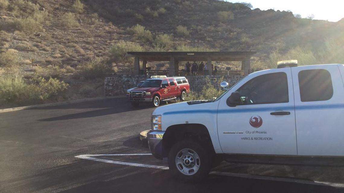 In this June 5, 2016, image, Phoenix firefighters work to rescue a hiker from a trail on North Mountain. Human remains were found on the same mountain on Aug. 1, 2022, and a woman was found dead on a trail on July 26, 2022, police said.