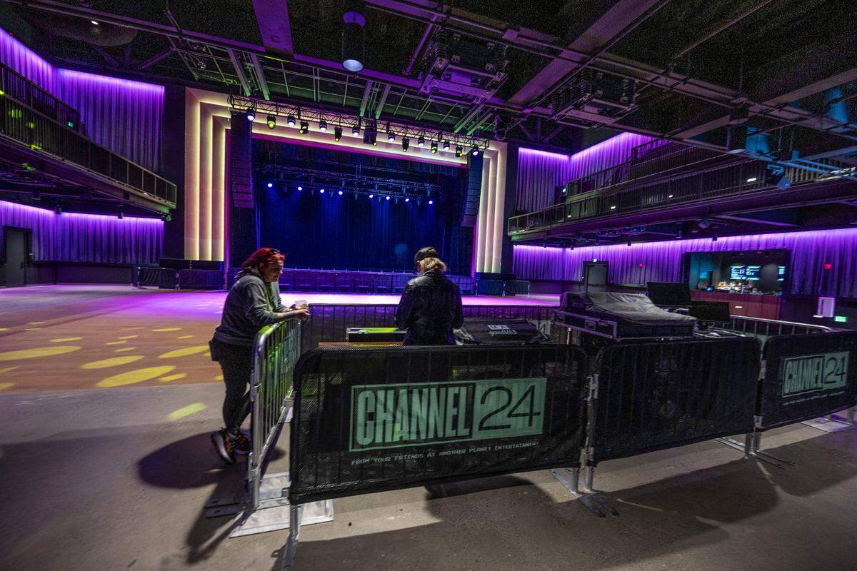 People work at the soundboard at Channel 24 in midtown Sacramento on Wednesday, the day before its grand opening concert.