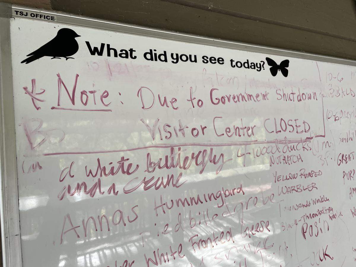 A whiteboard outside the Cosumnes River Preserve’s Visitor Center informs the public the center is closed that due to the government shutdown on Sunday. As of Oct. 26, 2025, the shutdown had lasted 26 days.
