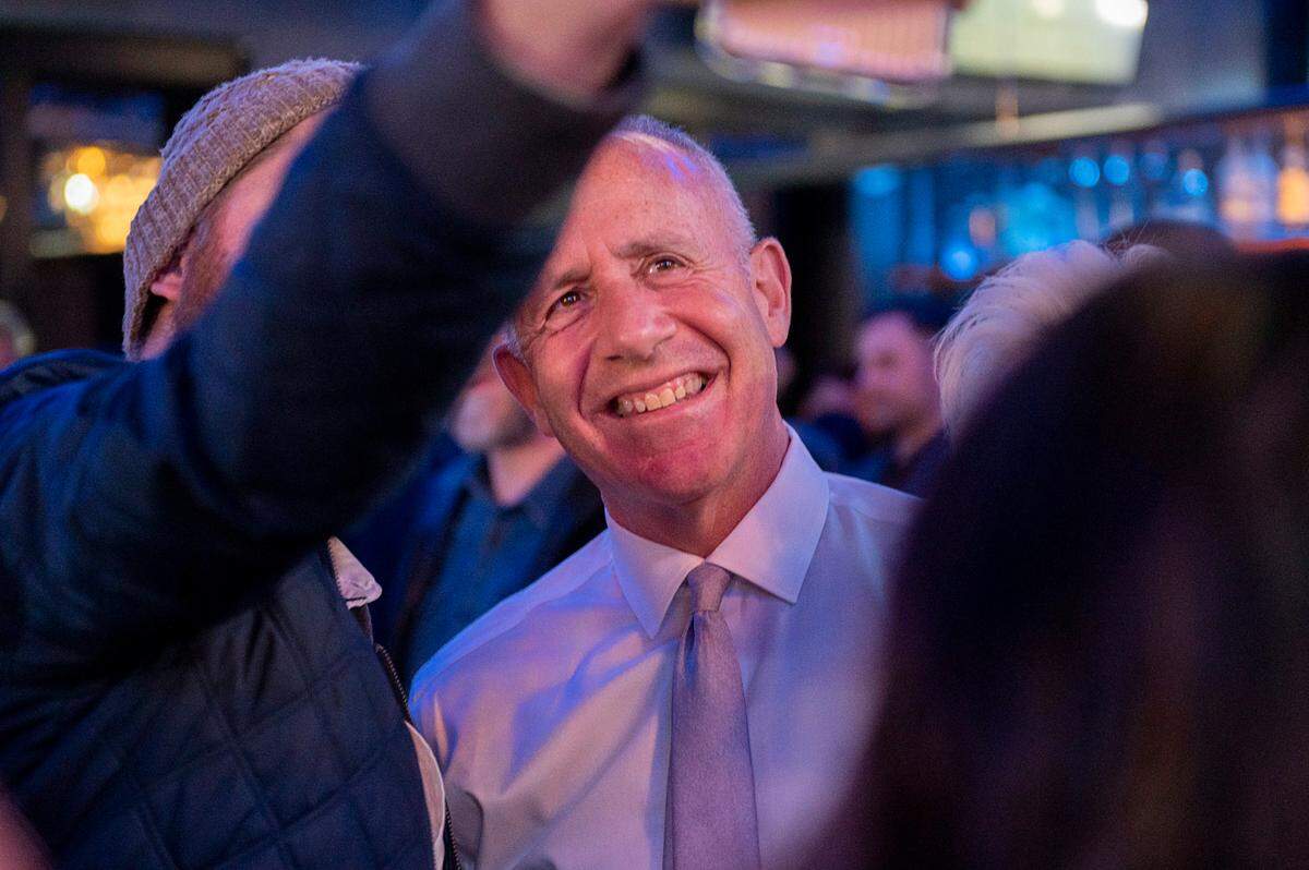 Sacramento Mayor Darrell Steinberg greets a supporter during his election night party at Mango’s in Sacramento on March 3, 2020. The mayor was re-elected with 77% of the vote.