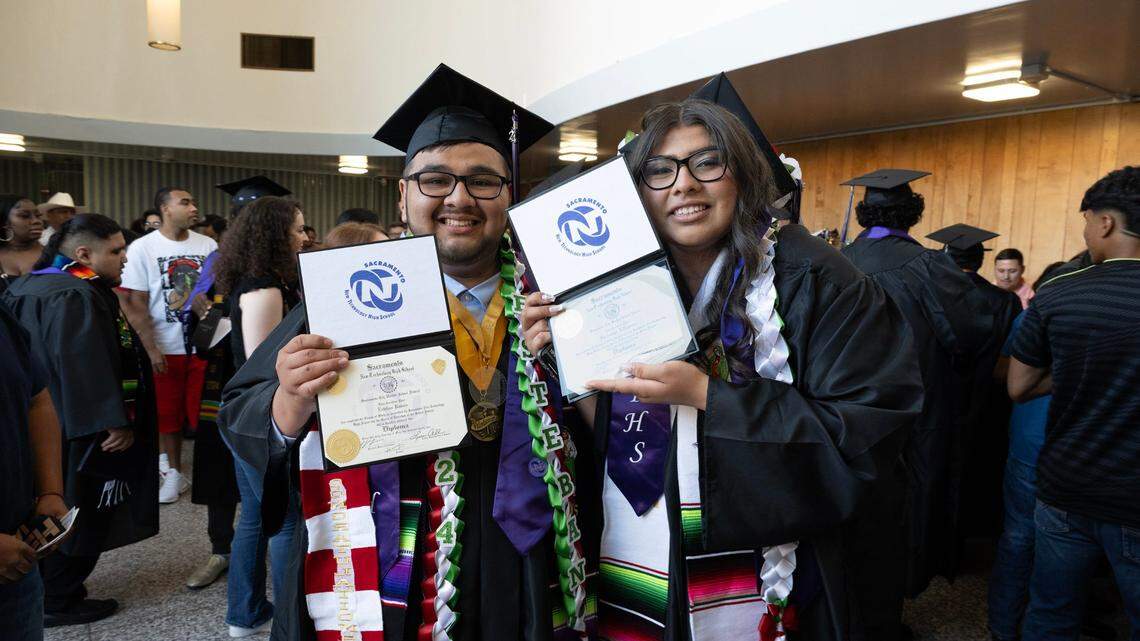 Valedictorian Estaban Ramos and his aunt, Guadalupe Villagomez, graduate from Sacramento New Technology at a ceremony at Burbank High School on Friday, May 31, 2024.