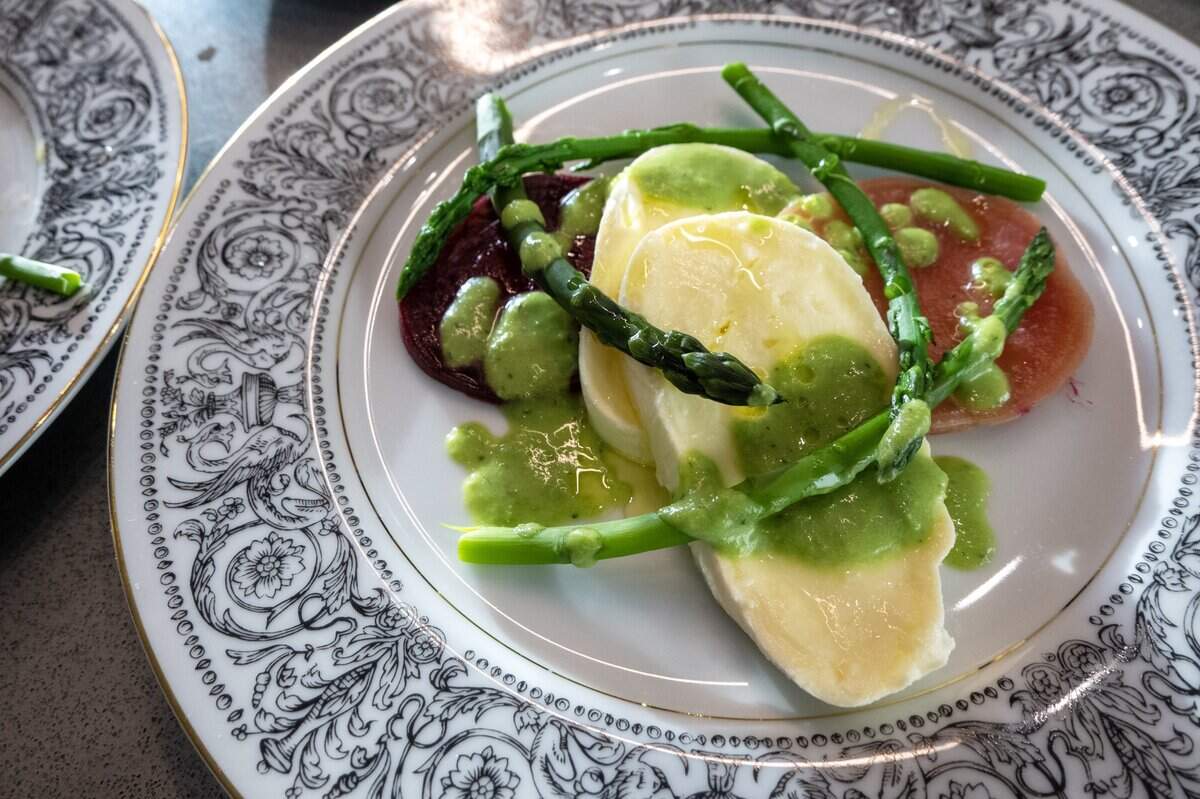 Beet with asparagus, mozzarella cheese and pea puree is prepared at Blue Ruby Farm in Browns Valley.