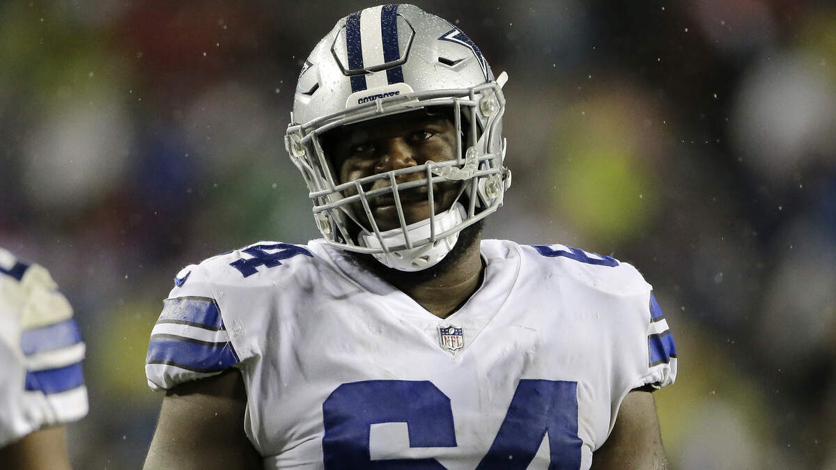 Dallas Cowboys offensive guard Jonathan Cooper stands on the field during a game against the Washington Redskins, Sunday, Oct. 29, 2017, in Landover, Md.