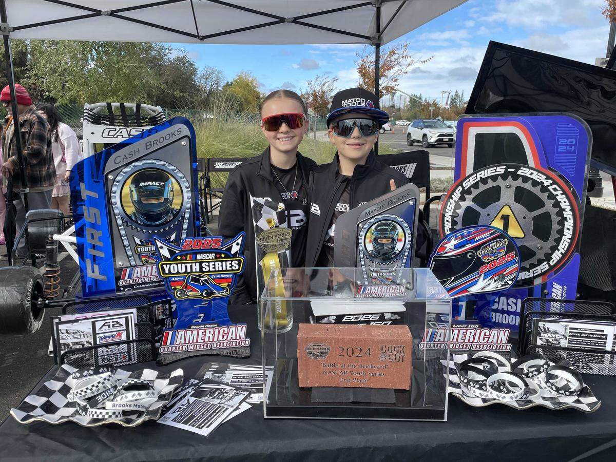 Siblings, Maycie and Cash Brooks, are participants in the NASCAR Youth Series and showcased their first and second place trophies.