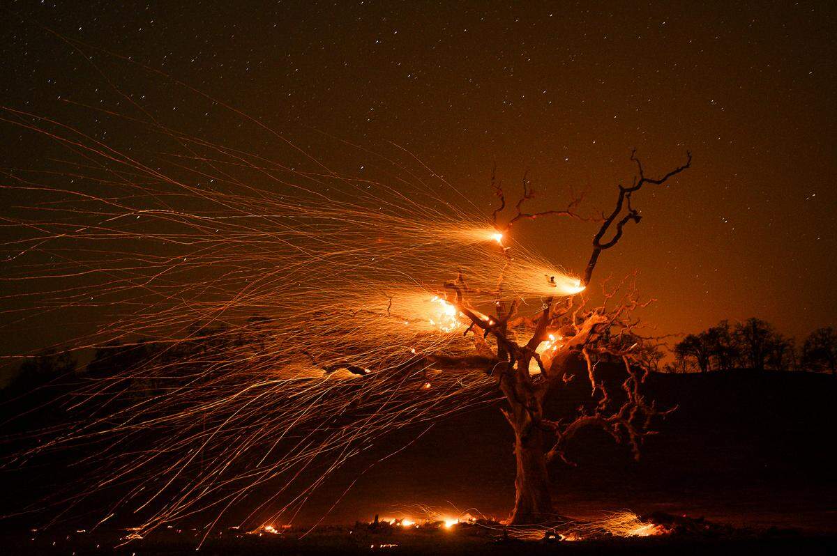The Kincade Fire burns during the night east of Hwy 128 during a time exposure near Sonoma County in October 2019.