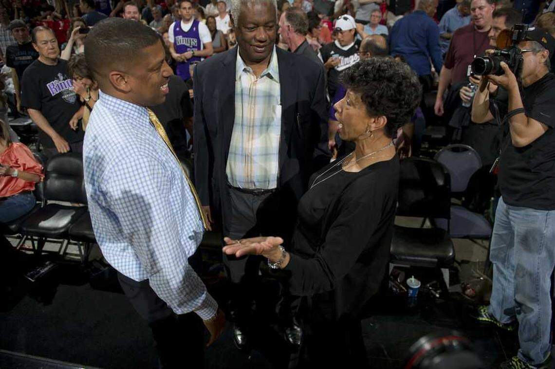 Sacramento Mayor Kevin Johnson and his mother, Georgia West, talk with Oscar Robertson during the Sacramento Kings against the Oklahoma City Thunder at Power Balance Pavilion in Sacramento in 2012. Georgia Rose Peat West died peacefully Monday, Dec. 23, 2024, at her Oak Park home with her sons, former Sacramento Mayor Kevin Johnson and marketing executive Ronnie West, beside her.