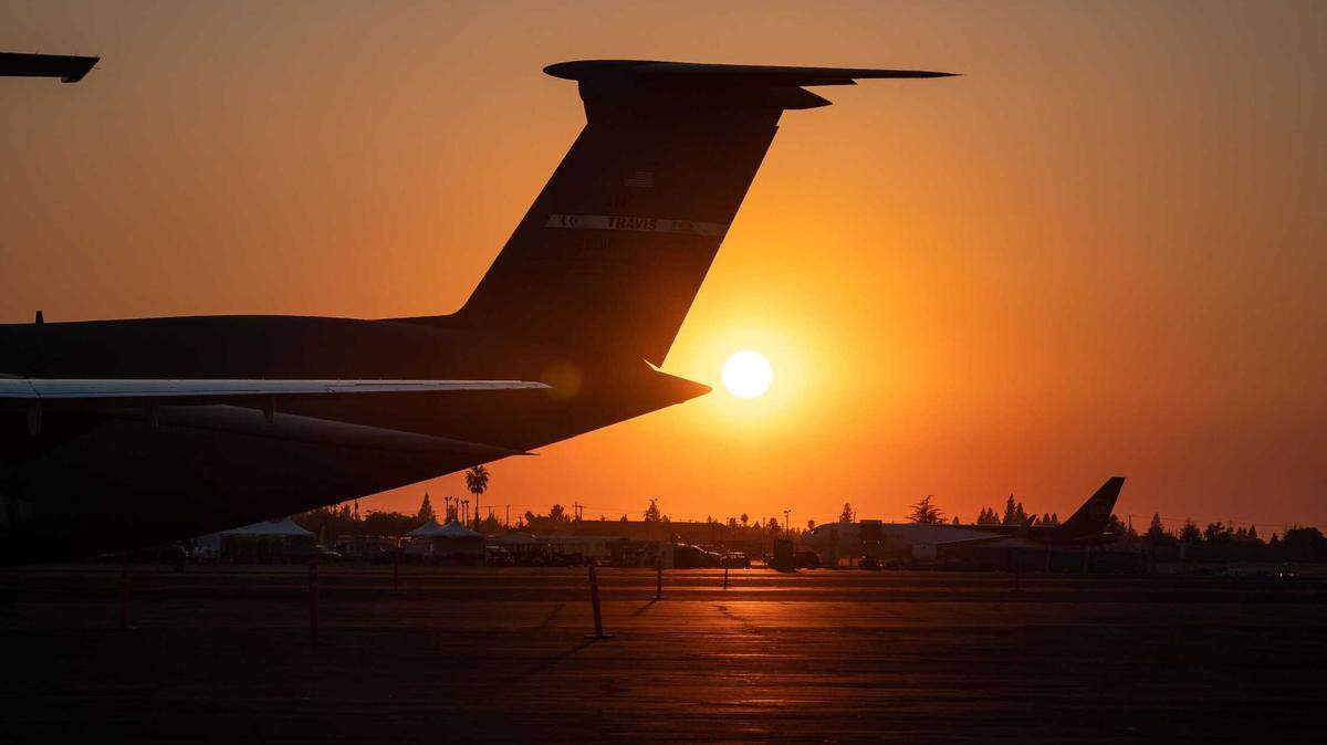 An Air Force C-5M Super Galaxy, left, from Travis Air Force Base, is parked with other aircraft at Mather Airport in 2021. The airfield drew nearly 2,000 noise complaints in 2024 from a single Folsom resident tied to Mather operations.