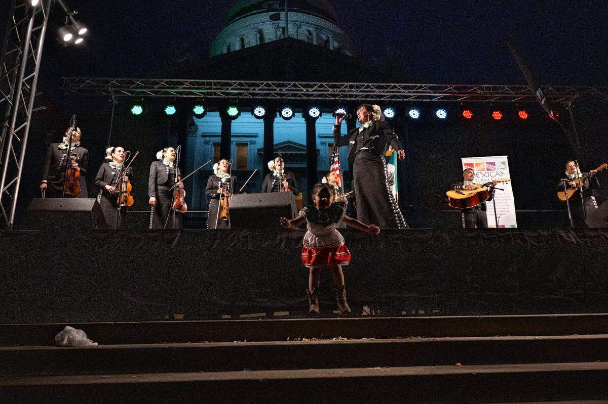 Participants of a celebration of the Mexican Day of Independence gather at the west steps of the State Capitol to celebrate on Thursday, Sept. 15, 2022.