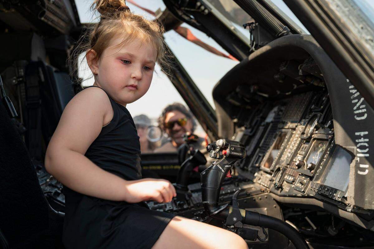 Sutton Shaffer, 4, sits in the cockpit of a Sikorsky HH-60 Pave Hawk at the California Capital Airshow on Sunday at Mather Airport.