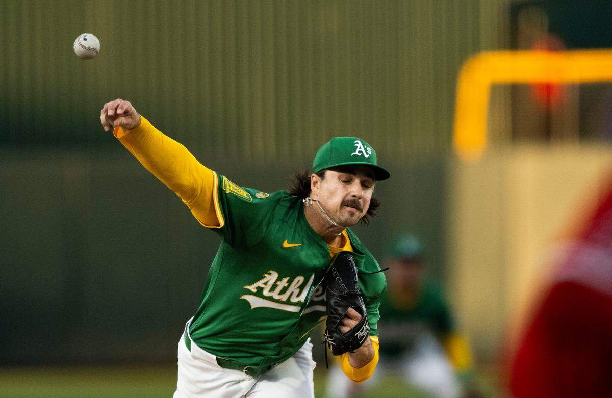 The Athletics’ J.T. Ginn (70) pitches during a MLB game against the Los Angeles Angels at Sutter Health Park in West Sacramento on Monday.