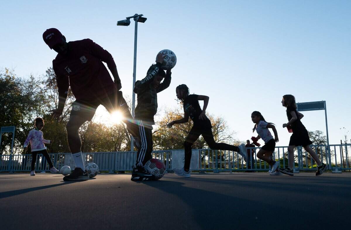 Children participate in a soccer workshop with Sacramento Republic FC clinics coaches Monday, Nov. 29, 2021, the opening day of the Del Paso Heights Sports Complex in Sacramento.