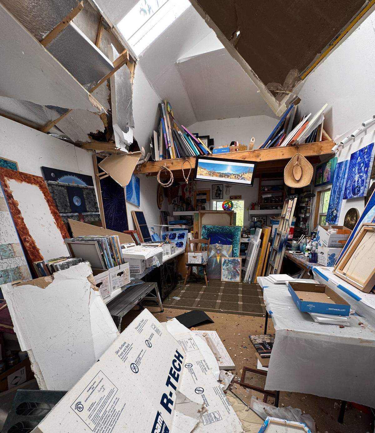 The interior of the Colfax-area studio of artist Stan Padilla after the building was crushed by a tree on Sunday.