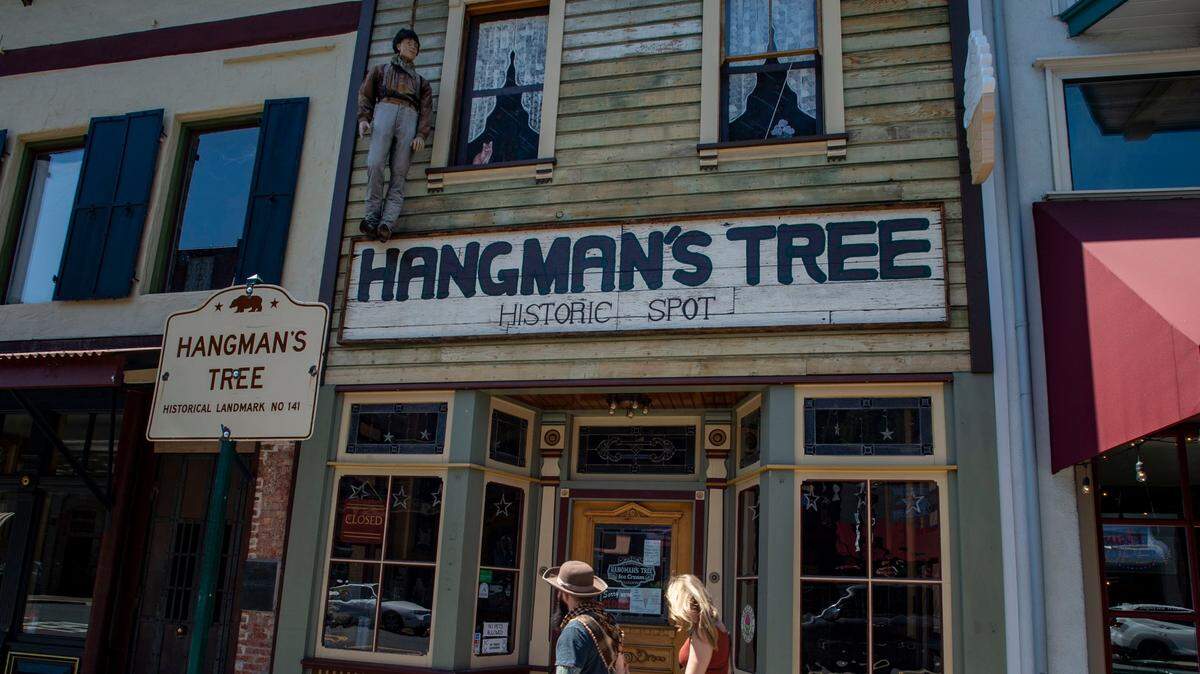 A dummy hangs from a noose above the Hangman’s Tree Ice Cream Saloon in downtown Placerville in June 2020. After taking it down following the first week of the protests against police brutality that swept the country in the wake of the police killing of George Floyd, the owner of the shop put the dummy back up after a cleaning.