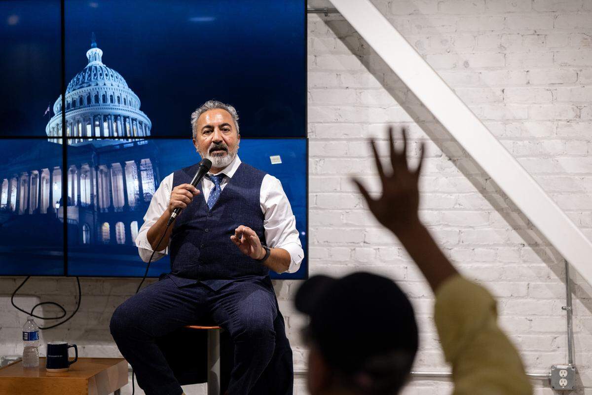 Rep. Ami Bera, D-Elk Grove, speaks at a town hall meeting with Sacramento Bee subscribers on Thursday in The Bee’s newsroom. 