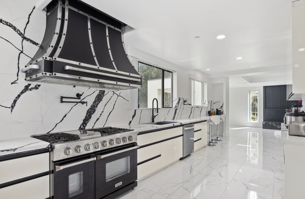 The kitchen has 100 feet of counter space.