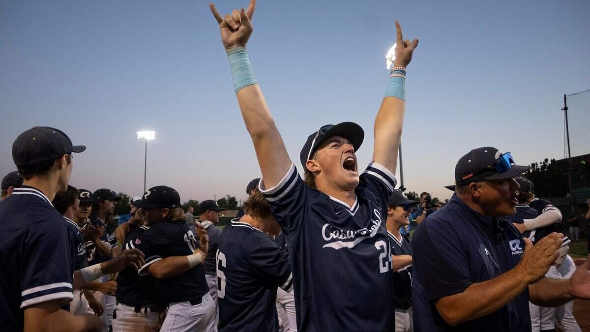 Casa Roble’s Carter Gustafson celebrates with teammates following his team’s 6-2 victory over Twelve Bridges in a CIF Sac-Joaquin Section Division IV baseball section championship game on Wednesday at Sacramento City College.