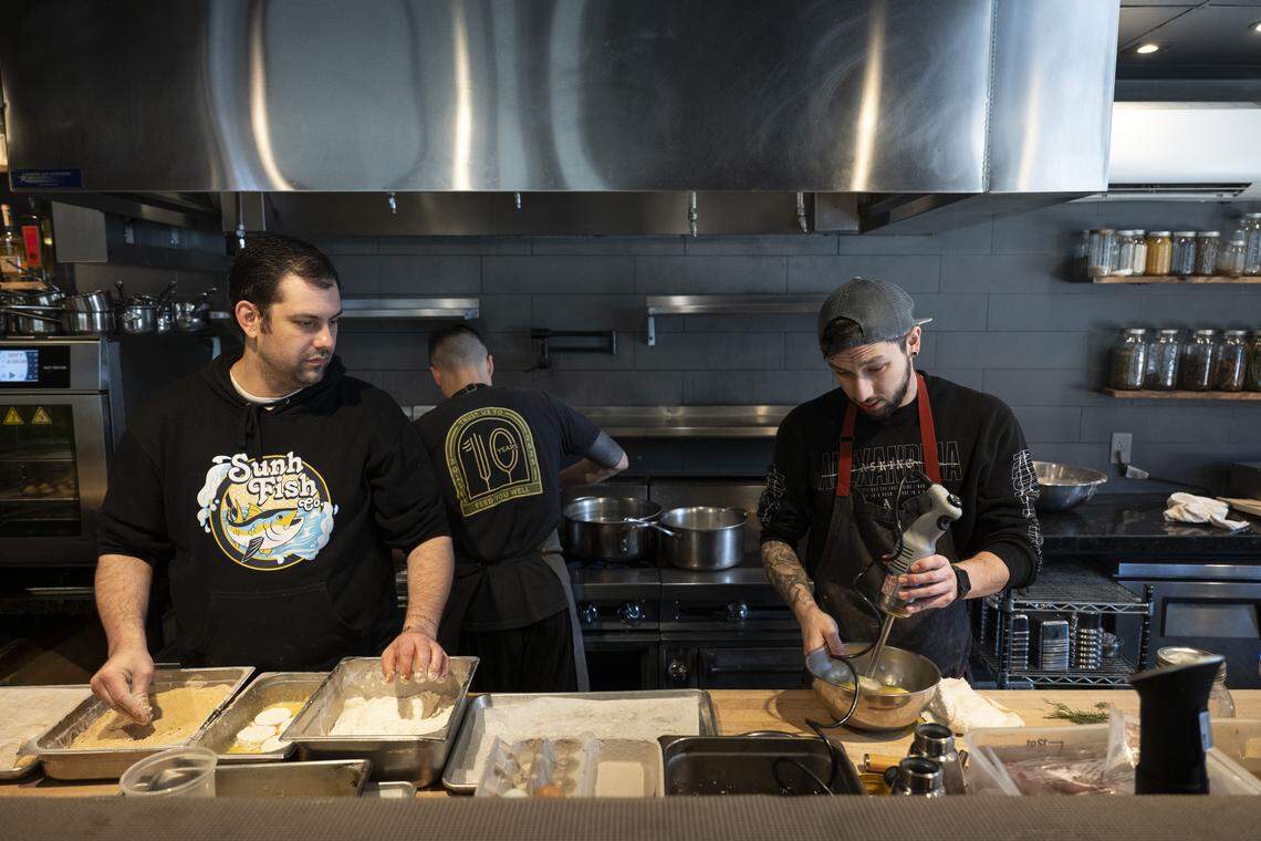The kitchen staff works to prepare for Localis’s return of brunch service at their restaurant in Sacramento on Sunday, Feb. 22, 2026.