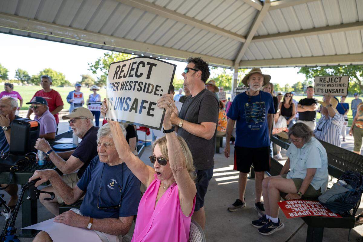 Melodie Rufer, a 40-year resident of the Natomas area, reacts to a speech opposing the Upper Westside development on Tuesday at a rally of more than 100 area residents and community leaders at Westlake Community Park.