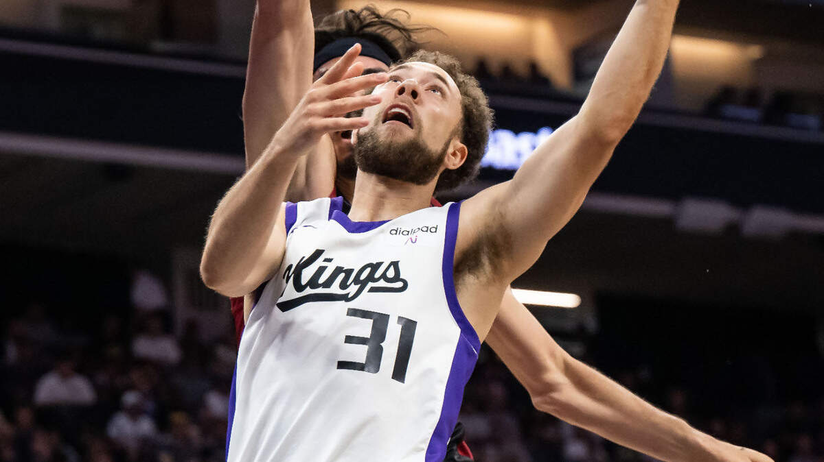 Sacramento Kings guard Jordan Ford (31) drives to score a layup past Miami Heat forward Jaime Jaquez Jr. (11) during the first half of their California Classic NBA summer league basketball game Wednesday, July 5, 2023, at Golden 1 Center.