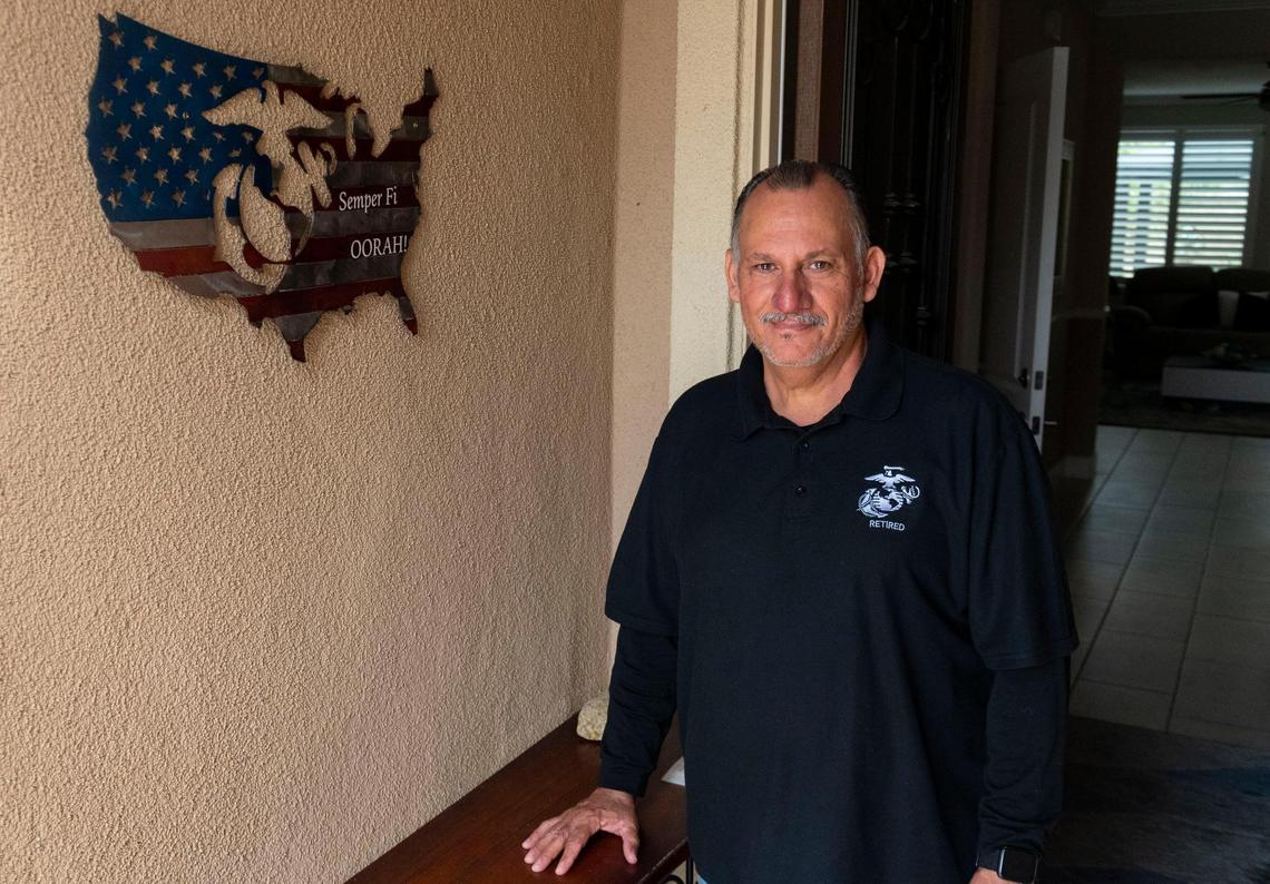 Angelo Sebazzo, retired from the Marine Corps, stands in his home in Lodi, Calif., on Friday, Sept. 19, 2020. Sebazzo relied on his military pension and government aid to pay bills after being laid off two different times during the pandemic.