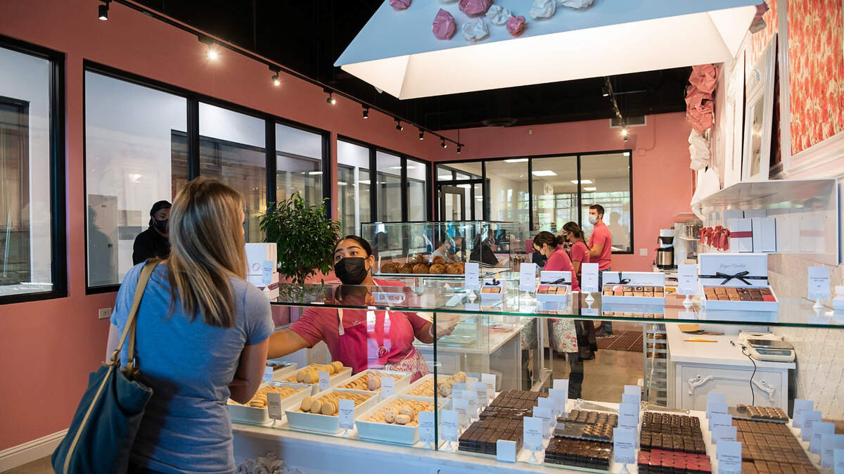 Customers purchase baked goods on the first day of opening at the new Ginger Elizabeth Patisserie on Wednesday, Oct. 14, 2020, in midtown Sacramento.