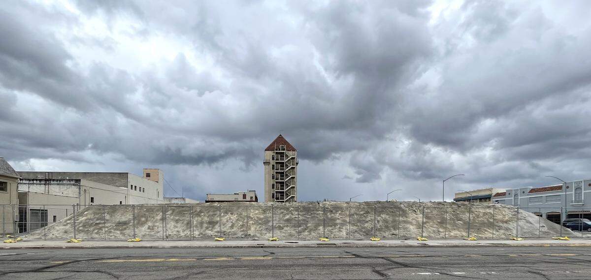 Mount Marysville, pictured Thursday stands more than 10 feet tall and entombs the remains of Hotel Marysville. It’s unclear when the city of Marysville will be able to clear the pile from downtown.