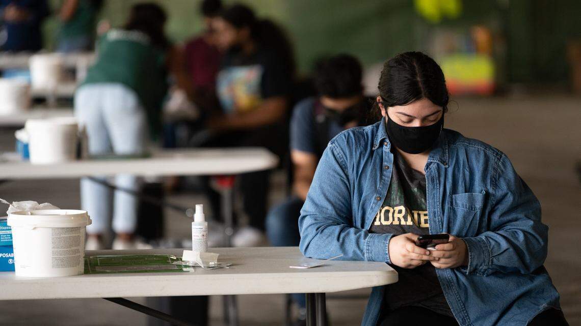 Sacramento State student Addison Beck, 20, who is vaccinated, waits for an on-campus COVID-19 test on Thursday, Sept. 16, 2021, at Sacramento State after she was exposed to the virus.