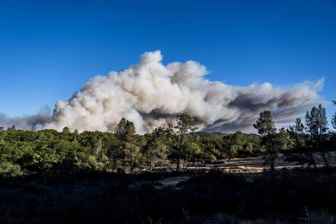 Smoke from the Park Fire covers the Butte County horizon northeast of Chico on Thursday. The fire jumped to more than 45,000 acres less than a day after sparking in Upper Bidwell Park, prompting evacuations.
