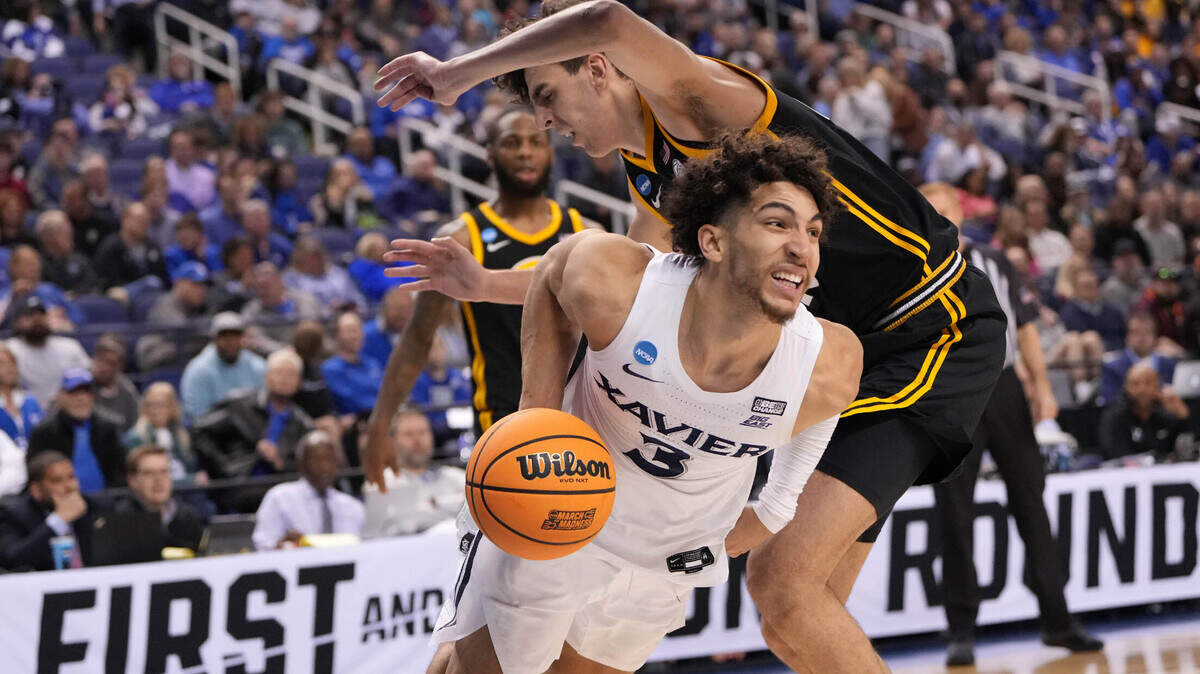 Xavier Musketeers guard Colby Jones (3) drives to the basket against Pittsburgh Panthers forward Guillermo Diaz Graham (25) during the second half in the second round of the 2023 NCAA men’s basketball tournament March 19, 2023, at Greensboro Coliseum in Greensboro, North Carolina.