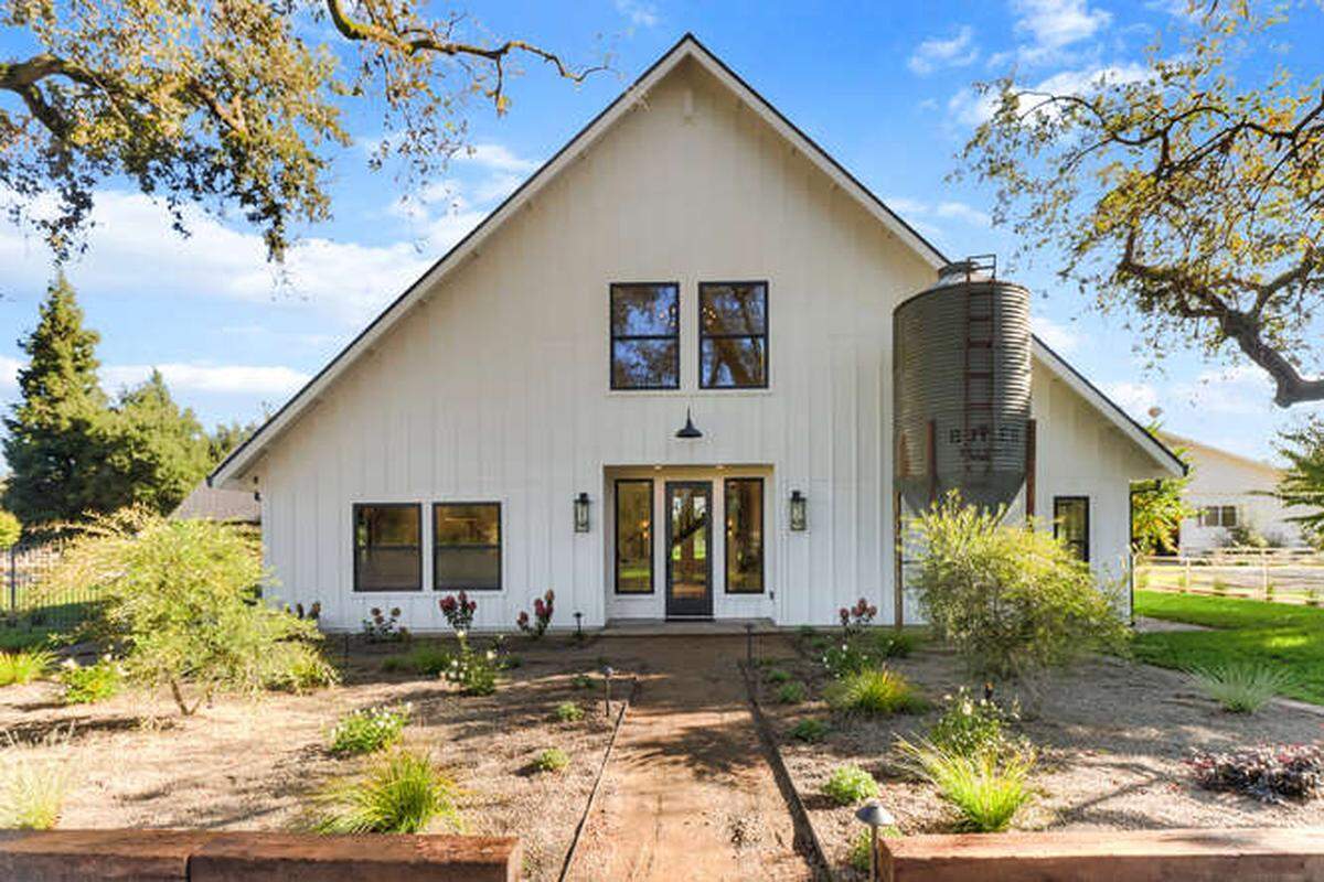 The main home at 10412 Sheldon Road in Elk Grove has three bedrooms and two bathrooms on a three-acre lot.