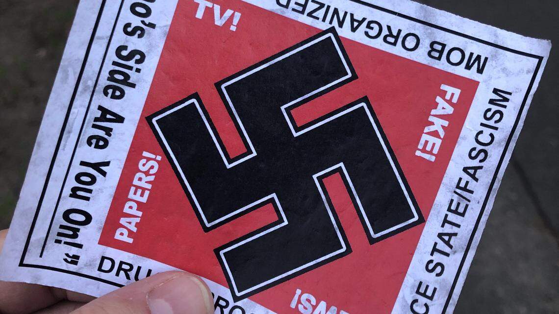 A swastika is seen on a leaflet dropped Friday during Sacramento State University’s annual “Bites on the Bridge” fundraiser.