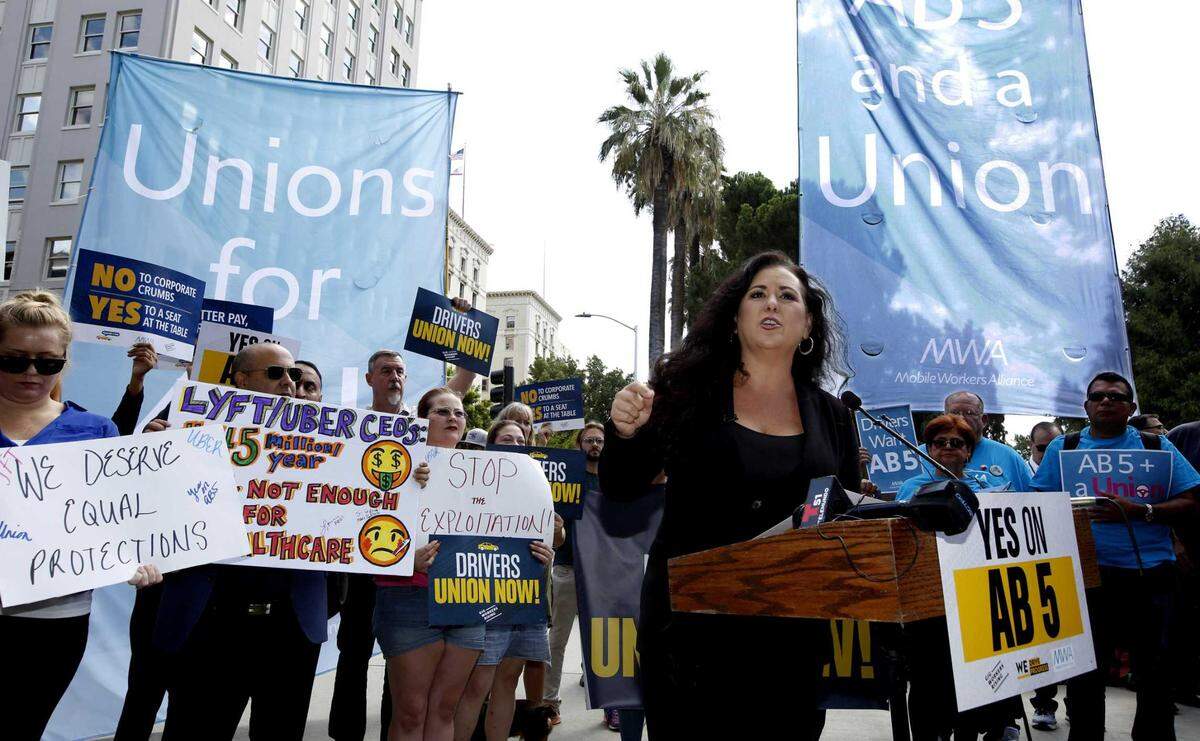 Assemblywoman Lorena Gonzalez, D-San Diego, speaks at rally in 2019 calling for passage of her measure to limit when companies can label workers as independent contractors, at the Capitol in Sacramento. During her time in the Legislature, Gonzalez authored several landmark laws expanding rights for workers, voters, women, and immigrants.