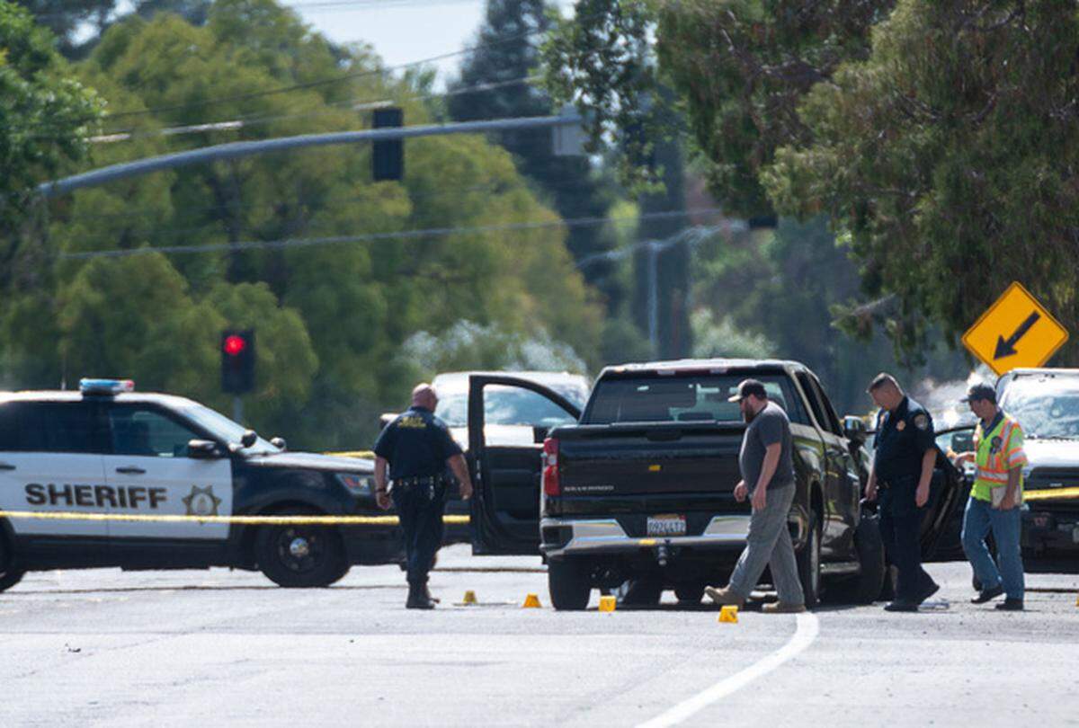 Sacramento County Sheriff’s deputies respond to a crime scene on Monday, June 21, 2021, on Cypress Avenue in Carmichael. The driver of a black pickup truck reportedly struck two people, killing one of them, before attacking two others with a gun and a crowbar. The suspect was shot by another citizen and was hospitalized.