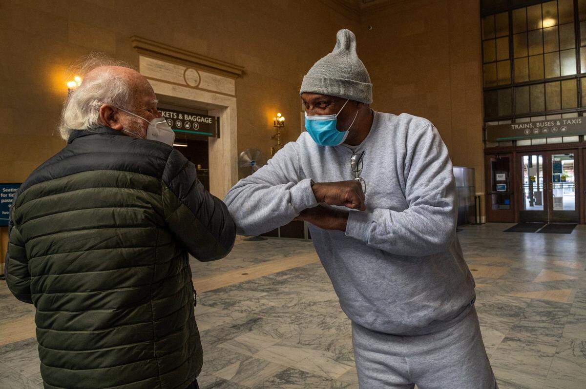 One of his biggest advocates, Edric Cane and Quinton Watts elbow bump at the Sacramento Valley Station after he was released Wednesday, Feb. 3. “He’s a good man,” Watts said to Cane’s wife, children and grandchildren who all came to welcome him out of prison. “Edric was really a gift to me.”