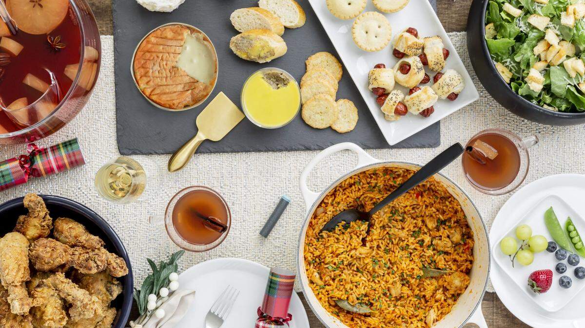 Sacramento residents Aki Berry and Meg Chano’s Ted Lasso-themed cookbook includes recipes for dishes such as jollof rice, pigs in a blanket and fried chicken.