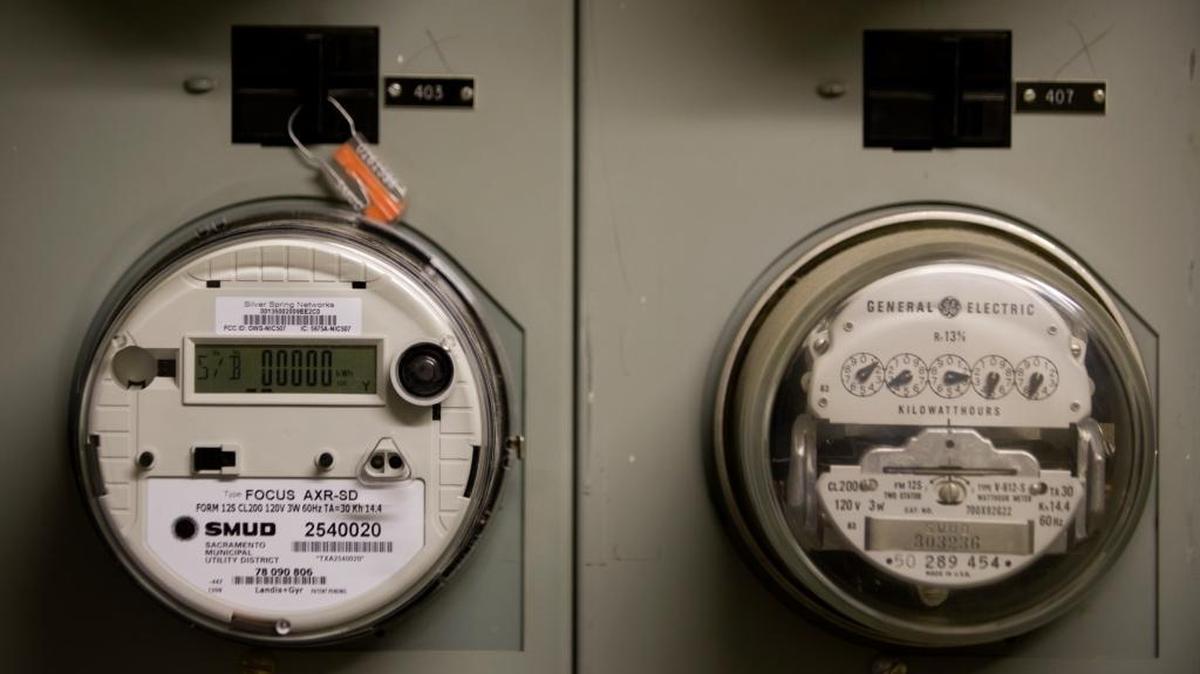 SMUD has installed smart meters, left, replacing the conventional GE model meters throughout the county.