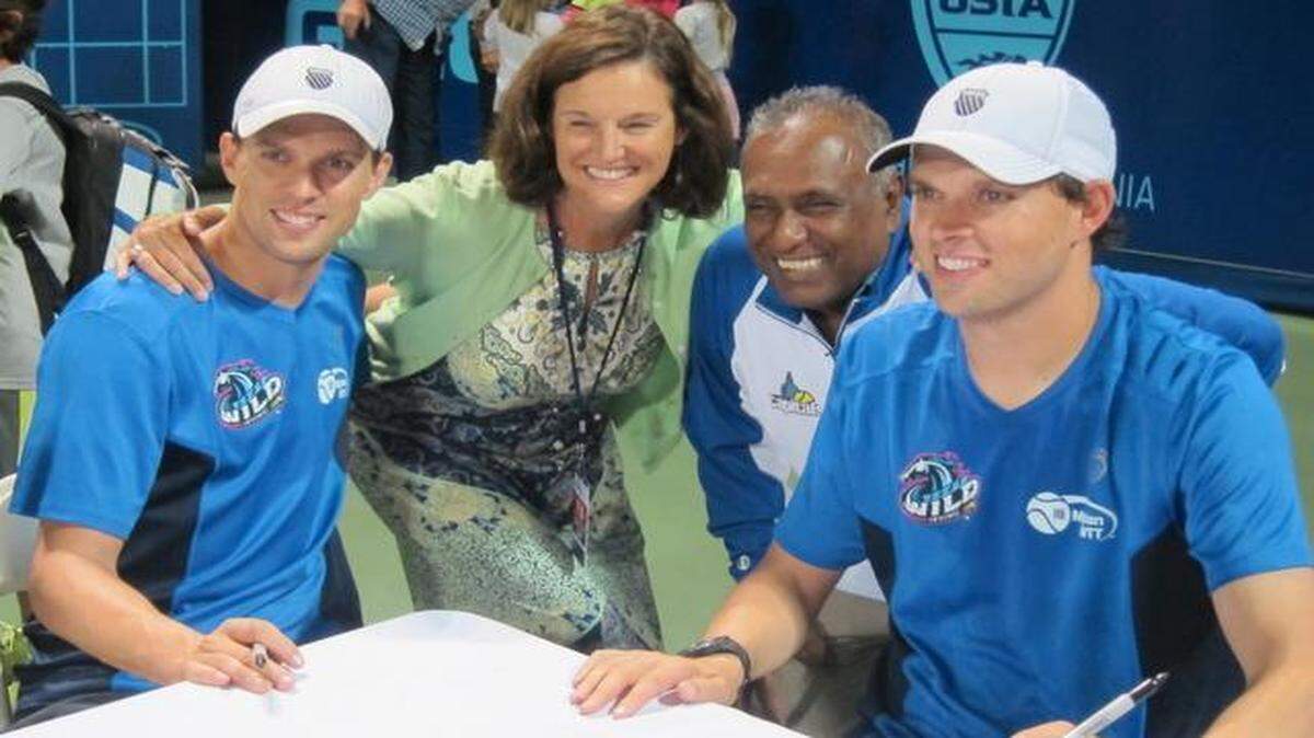
Former Sacramento Capitals owner Deepal Wannakuwatte and his wife, Betsy, pose with Texas tennis-playing brothers Mike and Bob Bryan in July 2013.
