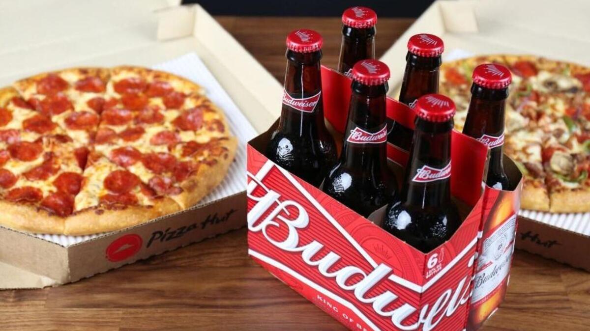 Pizza Hut is trying out beer and wine delivery, starting in Phoenix. \