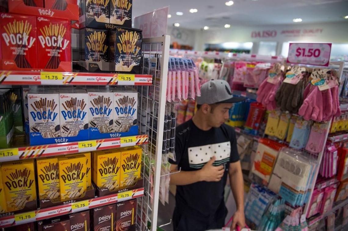 Shoppers search for bargains Tuesday at the recently opened Daiso Japan in the Westfield Galleria at Roseville shopping mall.