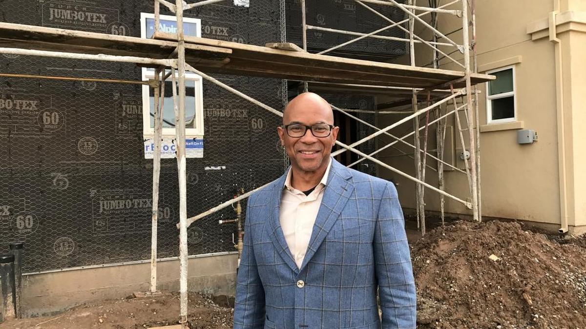 Sacramento City Councilman Allen Warren, seen at his company’s Renaissance Park neighborhood near Del Paso Boulevard: “I’m not a quitter.”
