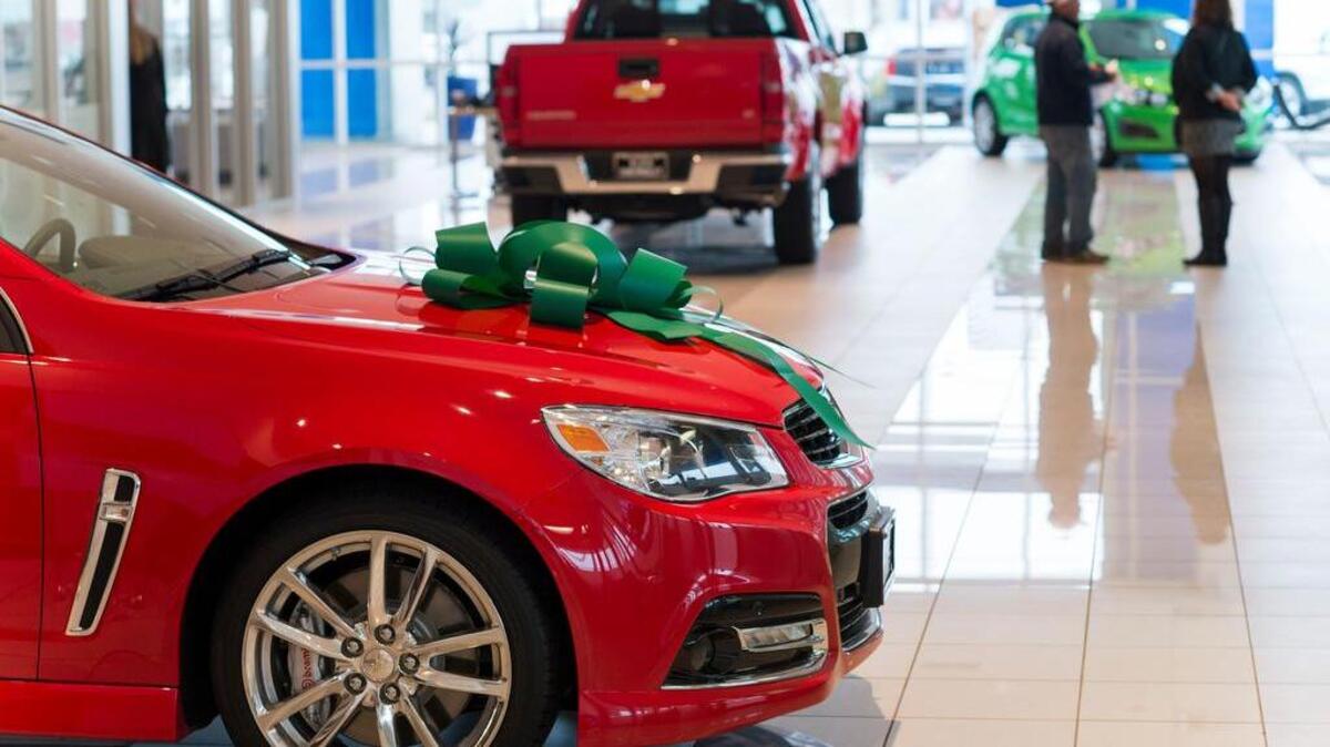 New vehicles are displayed in Kuni Chevrolet Cadillac last week. California’s sales surge is helping drive sales numbers toward an annual threshold never before seen in the United States – 18 million in a calendar year.