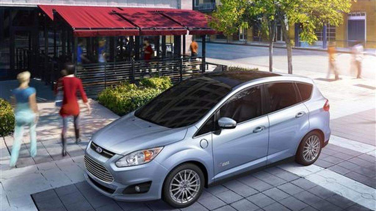 This image made available by Ford shows the 2015 Ford C-MAX Energi. The C-Max is sold as either a plug-in hybrid with onboard gasoline engine or as a non-plug-in hybrid with a gasoline four-cylinder supplemented by onboard-generated electric power.
