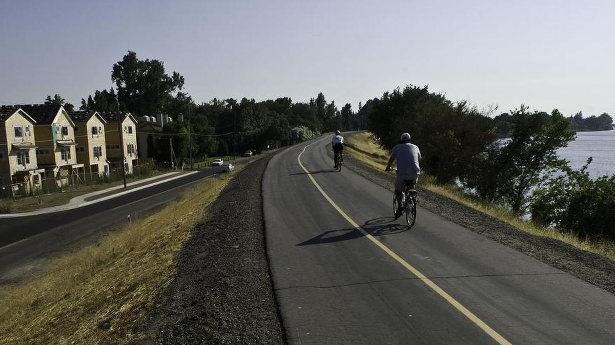 Houses line the levee along the Sacramento River on Riverside Blvd. near Rio Viale. Sacramento homeowners currently pay, on average, an assessment of $57 per year as part of the Consolidated Capital Assessment District. The proposed increase would add an average of $42, for a total of $99 per year.